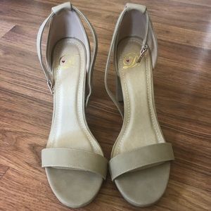 Brand new, without box, delicious tan heels.